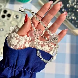 قاب ژله ای شفاف طرح ابر شاینی با آویز ابری گوشی آیفون 17 ایر