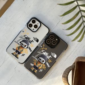 قاب موبایل iPhone 13Promax سفارشی شفاف | north face smile (کد 0356)